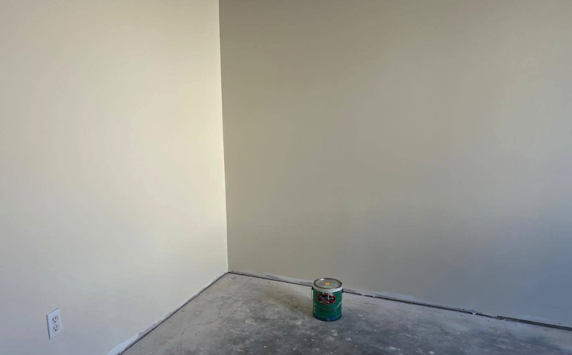 Wall repaired and freshly painted after drywall damage