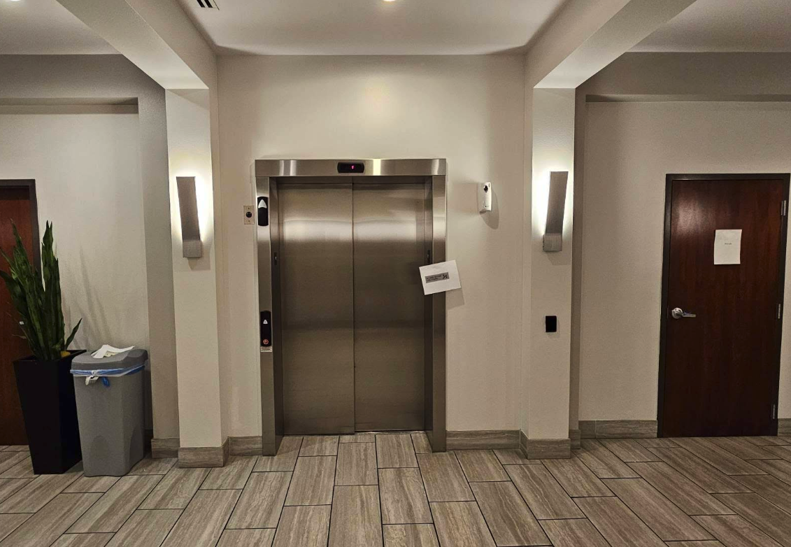 Freshly painted commercial elevator lobby